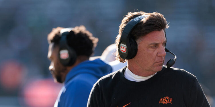 BOULDER, COLORADO - NOVEMBER 29: Head coach Mike Gundy of the Oklahoma State Cowboys looks on during the first quarter against the Colorado Buffaloes at Folsom Field on November 29, 2024 in Boulder, Colorado. (Photo by Andrew Wevers/Getty Images)