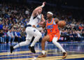 OKLAHOMA CITY, OKLAHOMA - DECEMBER 10: Shai Gilgeous-Alexander #2 of the Oklahoma City Thunder handles the ball in front of Luka Doncic #77 of the Dallas Mavericks during the first half at Paycom Center on December 10, 2024 in Oklahoma City, Oklahoma. NOTE TO USER: User expressly acknowledges and agrees that, by downloading and or using this photograph, User is consenting to the terms and conditions of the Getty Images License Agreement. (Photo by Joshua Gateley/Getty Images)