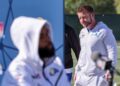 Rams coach Sean McVay walks past receiver Odell Beckham Jr. during Super Bowl media day.