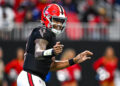 ATLANTA, GA  DECEMBER 22:  Atlanta quarterback Michael Penix Jr. (9) reacts during the NFL game between the New York Giants and the Atlanta Falcons on December 22nd, 2024 at Mercedes-Benz Stadium in Atlanta, GA.  (Photo by Rich von Biberstein/Icon Sportswire via Getty Images)