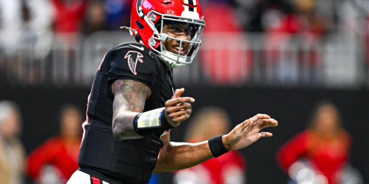 ATLANTA, GA  DECEMBER 22:  Atlanta quarterback Michael Penix Jr. (9) reacts during the NFL game between the New York Giants and the Atlanta Falcons on December 22nd, 2024 at Mercedes-Benz Stadium in Atlanta, GA.  (Photo by Rich von Biberstein/Icon Sportswire via Getty Images)