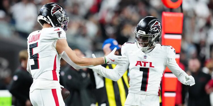 Drake London and Darnell Mooney celebrate