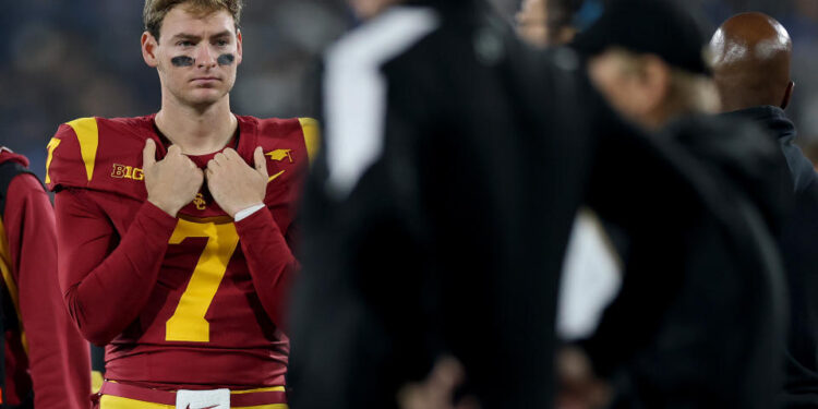 PASADENA, CALIFORNIA - NOVEMBER 23: Miller Moss #7 of the USC Trojans looks on from the sideline during the second half of a game against the UCLA Bruins at the Rose Bowl on November 23, 2024 in Pasadena, California.  (Photo by Sean M. Haffey/Getty Images)