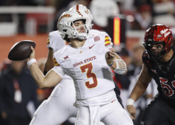 SALT LAKE CITY , UT - NOVEMBER 23:  Rocco Becht #3 of the Iowa State Cyclones throws a pass against the Utah Utes during the first half of their game at the Rice-Eccles Stadium on November 23, 2024 in Salt Lake City, Utah.(Photo by Chris Gardner/Getty Images)