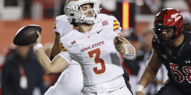 SALT LAKE CITY , UT - NOVEMBER 23:  Rocco Becht #3 of the Iowa State Cyclones throws a pass against the Utah Utes during the first half of their game at the Rice-Eccles Stadium on November 23, 2024 in Salt Lake City, Utah.(Photo by Chris Gardner/Getty Images)