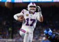 Buffalo Bills quarterback Josh Allen carries the ball for a touchdown against the Lions. (Photo by Jorge Lemus/NurPhoto via Getty Images)