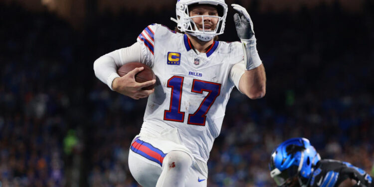 Buffalo Bills quarterback Josh Allen carries the ball for a touchdown against the Lions. (Photo by Jorge Lemus/NurPhoto via Getty Images)