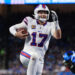 Buffalo Bills quarterback Josh Allen carries the ball for a touchdown against the Lions. (Photo by Jorge Lemus/NurPhoto via Getty Images)