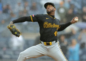 Sep 28, 2024; Bronx, New York, USA; Pittsburgh Pirates relief pitcher Aroldis Chapman (45) pitches against the New York Yankees during the ninth inning at Yankee Stadium. Mandatory Credit: Brad Penner-Imagn Images