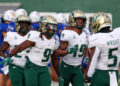 HONOLULU, HAWAII - DECEMBER 24: Ta'Ron Keith #9 of the South Florida Bulls celebrates with Nay'Quan Wright #5 after scoring a touchdown during the first half of the game against the San Jose Spartans at the Clarence T.C. Ching Athletics Complex on December 24, 2024 in Honolulu, Hawaii. (Photo by Darryl Oumi/Getty Image