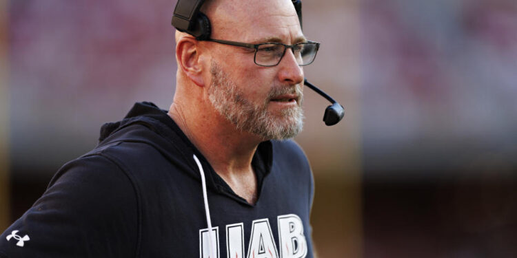 FAYETTEVILLE, ARKANSAS - SEPTEMBER 14: Head Coach Trent Dilfer of the UAB Blazers during a game against the Arkansas Razorbacks at Donald W. Reynolds Razorback Stadium on September 14, 2024 in Fayetteville, Arkansas. The Razorbacks defeated the Blazers 37-27.  (Photo by Wesley Hitt/Getty Images)