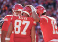 Nov 10, 2024; Kansas City, Missouri, USA; Kansas City Chiefs tight end Travis Kelce (87) celebrates with quarterback Patrick Mahomes (15) after scoring against the Denver Broncos during the game at GEHA Field at Arrowhead Stadium. Mandatory Credit: Denny Medley-Imagn Images