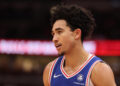 CHICAGO, ILLINOIS - DECEMBER 08: Jared McCain #20 of the Philadelphia 76ers looks on against the Chicago Bulls during the second half at the United Center on December 08, 2024 in Chicago, Illinois. NOTE TO USER: User expressly acknowledges and agrees that, by downloading and or using this photograph, User is consenting to the terms and conditions of the Getty Images License Agreement.  (Photo by Michael Reaves/Getty Images)