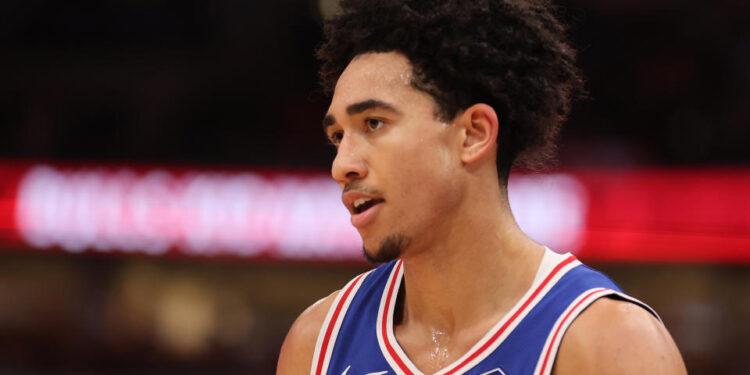 CHICAGO, ILLINOIS - DECEMBER 08: Jared McCain #20 of the Philadelphia 76ers looks on against the Chicago Bulls during the second half at the United Center on December 08, 2024 in Chicago, Illinois. NOTE TO USER: User expressly acknowledges and agrees that, by downloading and or using this photograph, User is consenting to the terms and conditions of the Getty Images License Agreement.  (Photo by Michael Reaves/Getty Images)