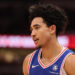 CHICAGO, ILLINOIS - DECEMBER 08: Jared McCain #20 of the Philadelphia 76ers looks on against the Chicago Bulls during the second half at the United Center on December 08, 2024 in Chicago, Illinois. NOTE TO USER: User expressly acknowledges and agrees that, by downloading and or using this photograph, User is consenting to the terms and conditions of the Getty Images License Agreement.  (Photo by Michael Reaves/Getty Images)