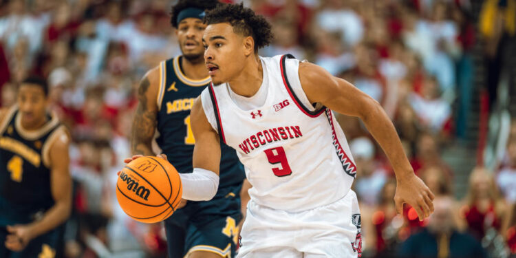 Wisconsin Badgers guard John Tonje #9 goes on a fast break against the Michigan Wolverines at the Kohl Center in Madison, Wisconsin, on December 3, 2024. (Photo by Ross Harried/NurPhoto via Getty Images)