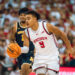 Wisconsin Badgers guard John Tonje #9 goes on a fast break against the Michigan Wolverines at the Kohl Center in Madison, Wisconsin, on December 3, 2024. (Photo by Ross Harried/NurPhoto via Getty Images)