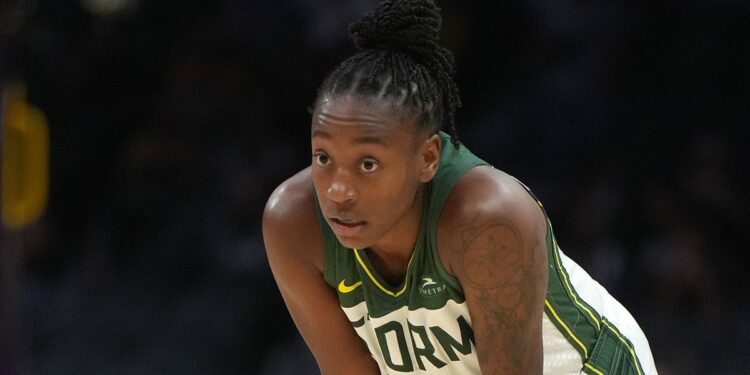 Jewell Loyd with her hands on her knees