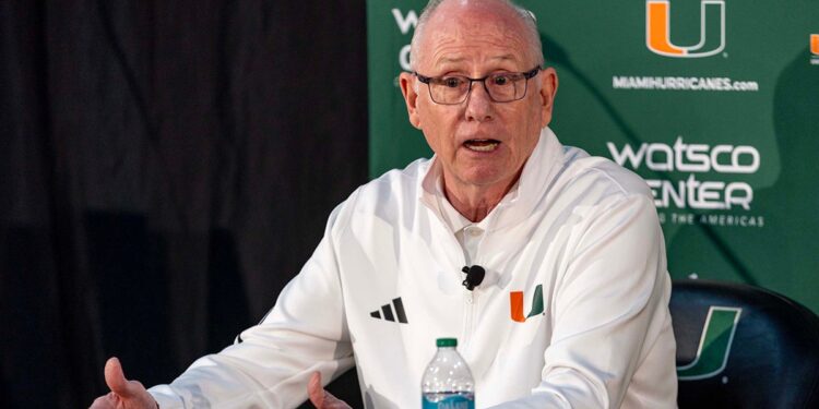 Jim Larranaga speaks at a press conference