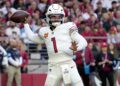 Kyler Murray throws