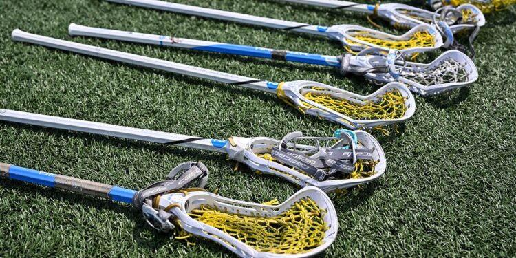 Lacrosse sticks on the field