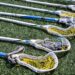 Lacrosse sticks on the field