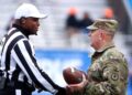 Rory Bernard shakes hand with Tennessee National Guard