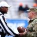 Rory Bernard shakes hand with Tennessee National Guard