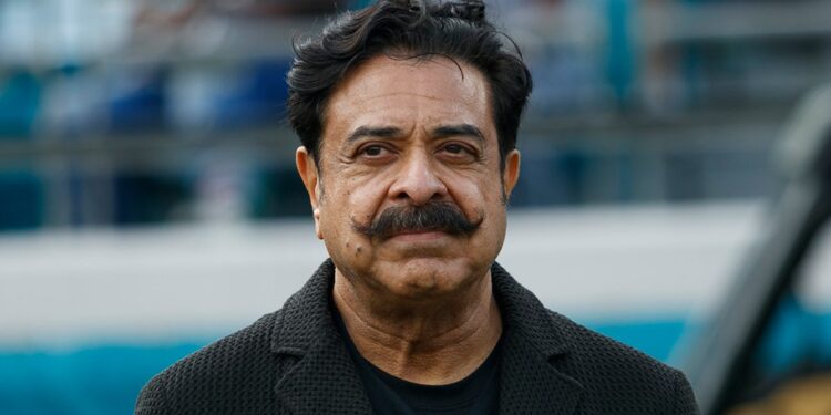 Shad Khan on the field