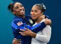 Simone Biles and Jordan Chiles embrace