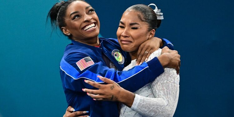 Simone Biles and Jordan Chiles embrace