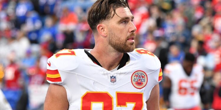 Travis Kelce looks on