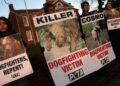 Animal advocates from PETA demonstrate as Michael Vick appears at Sussex County Courthouse for a plea agreement in his state dogfighting charges.