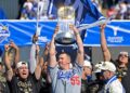 Walker Buehler raises World Series trophy