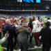 DETROIT, MICHIGAN - JANUARY 18: Washington Commanders players and coaches celebrate after defeating the Detroit Lions 45-31 in the NFC Divisional Playoff at Ford Field on January 18, 2025 in Detroit, Michigan.  (Photo by Nic Antaya/Getty Images)