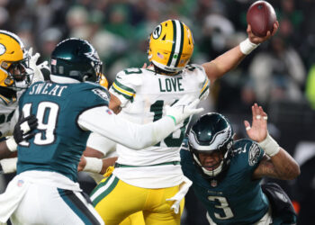 The Eagles' defense swarmed Jordan Love (10) and the Packers all day in their wild-card victory.  (Photo by Al Bello/Getty Images)