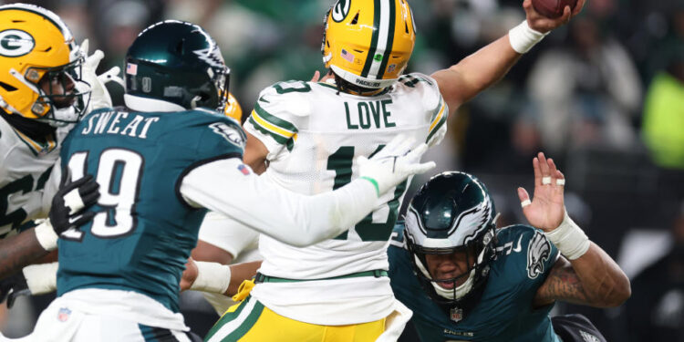 The Eagles' defense swarmed Jordan Love (10) and the Packers all day in their wild-card victory.  (Photo by Al Bello/Getty Images)