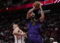 Los Angeles Lakers forward Anthony Davis (3) is fouled by Houston Rockets center Alperen Sengun.