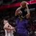 Los Angeles Lakers forward Anthony Davis (3) is fouled by Houston Rockets center Alperen Sengun.