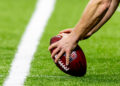 Dec 29, 2024; New Orleans, Louisiana, USA;  Detailed view of the NFL football being hiked during the second half of the game between the New Orleans Saints and the Las Vegas Raiders at Caesars Superdome. Mandatory Credit: Stephen Lew-Imagn Images