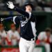 Korea's Hyeseong Kim follows through and looks up while hitting a sacrifice fly during the World Baseball Classic