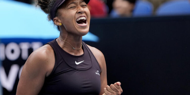 Naomi Osaka of Japan reacts after winning a point against Karolina Muchova of the Czech Republic during their second round match at the Australian Open tennis championship in Melbourne, Australia, Wednesday, Jan. 15, 2025. (AP Photo/Asanka Brendon Ratnayake)