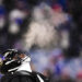 Baltimore Ravens quarterback Lamar Jackson (8) warms up before playing against the Buffalo Bills in an NFL divisional playoff football game, Sunday, Jan. 19, 2025, in Orchard Park, N.Y. (AP Photo/Gene J. Puskar)