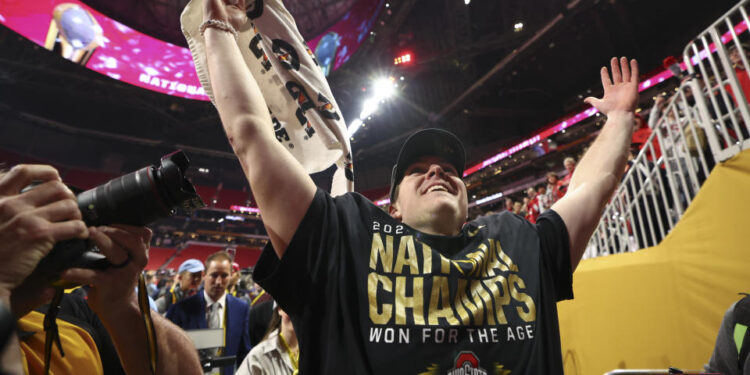 ATLANTA, GEORGIA - JANUARY 20: Will Howard #18 of the Ohio State Buckeyes walks off the field after winning the 2025 College Football Playoff National Championship against the Notre Dame Fighting Irish held at Mercedes-Benz Stadium on January 20, 2025 in Atlanta, Georgia. (Photo by Jamie Schwaberow/Getty Images)