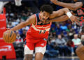 Jan 1, 2025; Washington, District of Columbia, USA; Washington Wizards guard Jordan Poole (13) drives to the basket against Chicago Bulls forward Dalen Terry (25) during the second quarter at Capital One Arena. Mandatory Credit: Reggie Hildred-Imagn Images