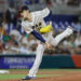 Mar 20, 2023; Miami, Florida, USA; Japan starting pitcher Roki Sasaki (14) delivers a pitch during the first inning against Mexico at LoanDepot Park. Mandatory Credit: Sam Navarro-Imagn Images