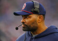 Dec 28, 2024; Foxborough, Massachusetts, USA; New England Patriots head coach Jerod Mayo watches from the sideline as they take on the Los Angeles Chargers at Gillette Stadium. Mandatory Credit: David Butler II-Imagn Images