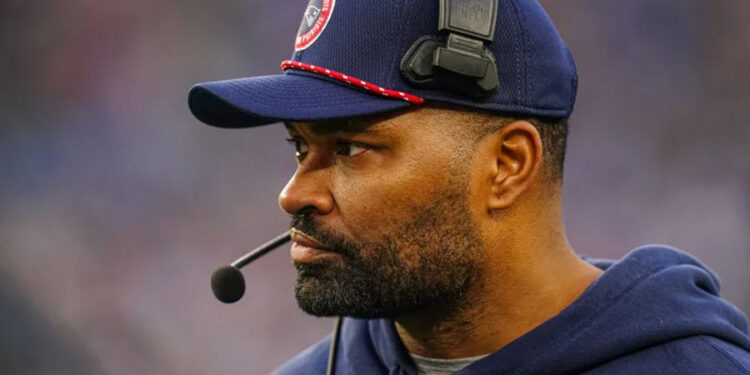 Dec 28, 2024; Foxborough, Massachusetts, USA; New England Patriots head coach Jerod Mayo watches from the sideline as they take on the Los Angeles Chargers at Gillette Stadium. Mandatory Credit: David Butler II-Imagn Images