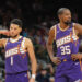 Nov 27, 2024; Phoenix, Arizona, USA; Phoenix Suns guard Devin Booker (1) and Phoenix Suns forward Kevin Durant (35) look on against the Brooklyn Nets during the second half at Footprint Center. Mandatory Credit: Joe Camporeale-Imagn Images