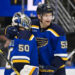 Nov 14, 2023; St. Louis, Missouri, USA; St. Louis Blues goaltender Jordan Binnington (50) and defenseman Colton Parayko (55) celebrate after the Blues defeated the Tampa Bay Lightning at Enterprise Center. credits: Jeff Curry-USA TODAY Sports